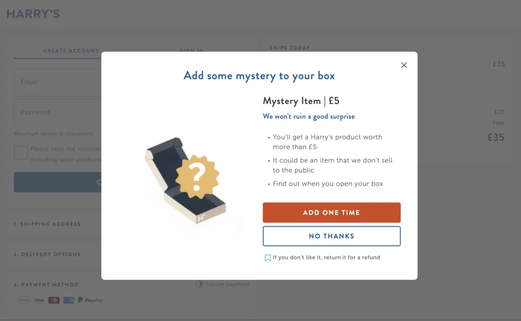 Harry's uses an exit intent popup in the cart to upsell the user on a mystery box for only 5 pounds.